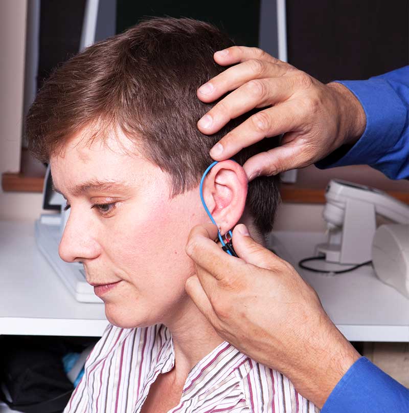 A Real Ear measurement test being performed by an audiologist/ hearing instrument specialist